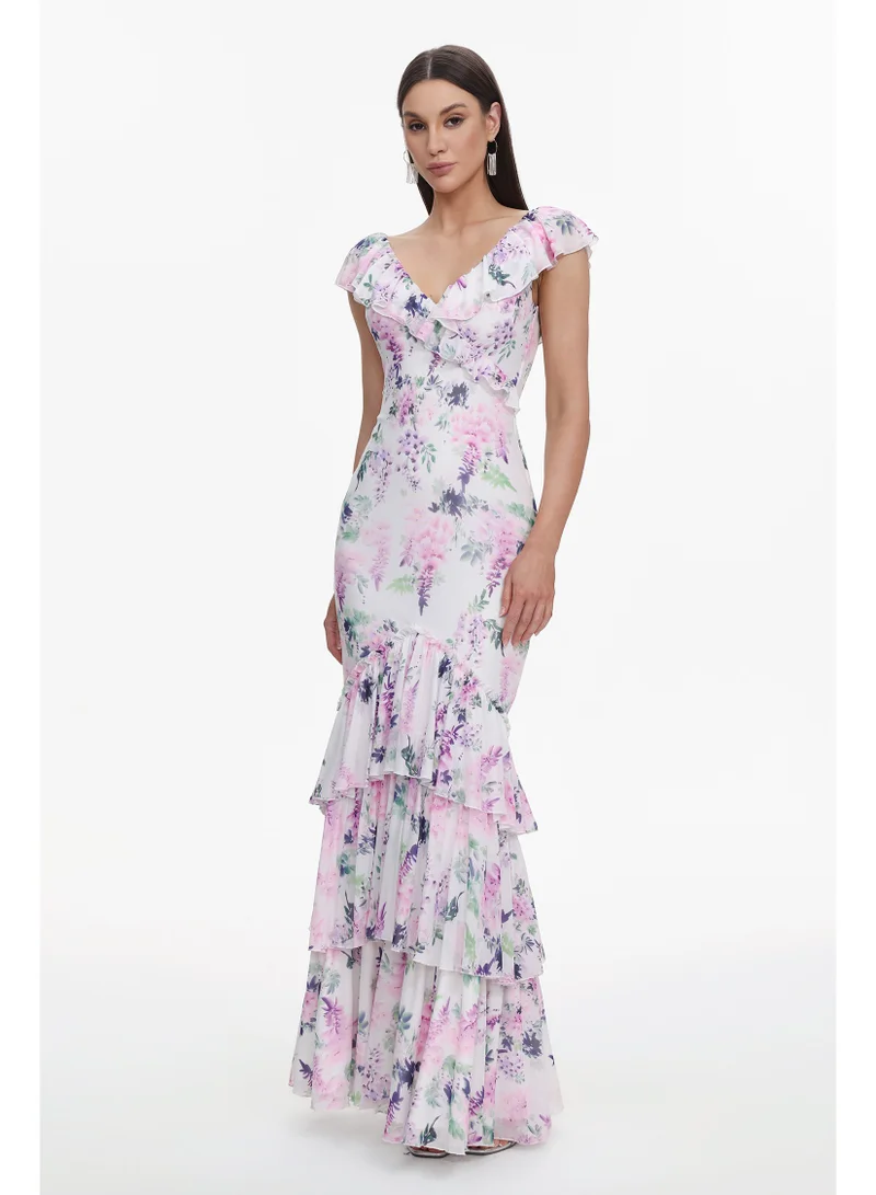 بيلا بارنيت فستان ماكسي رومانسي فضفاض بياقة على شكل حرف V بدون أكمام مزين بكشكشة وطبعة زهور من لافيسا